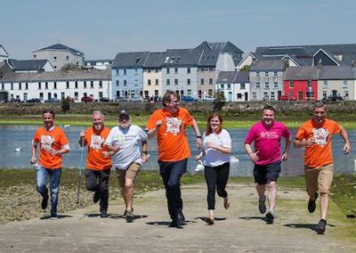 Ronan Scully pictured with the Mayor Neil McNeilis and participants of his Bay to Bay 300km walk 2018.